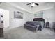 Serene main bedroom with bench, carpet floors, and tranquil decor at 319 Honeysuckle Ter, Auburn, GA 30011