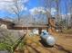 View of the home's backyard with an external propane tank at 3314 Henson Ln, Stockbridge, GA 30281