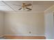 This bedroom features neutral paint, a ceiling fan, hardwood flooring, and ample natural light, creating a bright and comfortable space at 3314 Henson Ln, Stockbridge, GA 30281