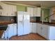 Bright kitchen featuring white cabinets, stainless steel appliances, and butcher block countertops at 3314 Henson Ln, Stockbridge, GA 30281