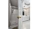 Bathroom featuring a walk-in shower, modern fixtures, and ample storage space at 205 Wynnfield Way, Mcdonough, GA 30252