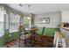 Dining area features a table with seating for four and a large window at 205 Wynnfield Way, Mcdonough, GA 30252