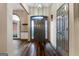 Inviting foyer with hardwood floors, arched window, and a neutral color palette, creating a warm welcome at 205 Wynnfield Way, Mcdonough, GA 30252