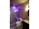 Modern bathroom featuring a glass-enclosed shower with a built-in bench and updated fixtures at 65 Lotus Ln, Covington, GA 30016