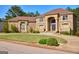 Beautiful brick home featuring well-maintained landscaping and a circular driveway at 65 Lotus Ln, Covington, GA 30016