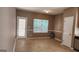 Bright kitchen featuring ample space and a door leading to the exterior at 128 Astilbe Meadow Dr, Locust Grove, GA 30248