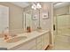 Bright bathroom showcasing a double vanity and a shower-tub combo at 100 Smokerise Trce, Peachtree City, GA 30269