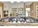 Close up showcasing the updated kitchen with granite counters and modern appliances at 100 Smokerise Trce, Peachtree City, GA 30269