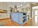Well-appointed kitchen featuring an island with extra storage space and seating at 100 Smokerise Trce, Peachtree City, GA 30269