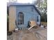 Shows the side exterior of the home with a mix of siding and brick at 2884 Haddon Dr, Rex, GA 30273