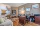 Elegant home office featuring custom built-ins, hardwood floors, and a well-organized workspace at 7415 Northampton Ct, Cumming, GA 30040
