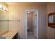 Bathroom featuring a vanity with a large mirror and an adjacent toilet room at 154 Waverly Way, Alpharetta, GA 30009
