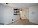 Bedroom with carpet, white walls, and mounted shelves at 154 Waverly Way, Alpharetta, GA 30009