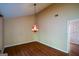 Dining room with wood floors and decorative light fixture at 154 Waverly Way, Alpharetta, GA 30009