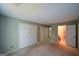 Main bedroom features carpet and double closets at 154 Waverly Way, Alpharetta, GA 30009