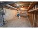 Unfinished basement area with a water heater at 204 Mitchell Rd, Fayetteville, GA 30214