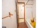 Small bathroom featuring a tiled shower and various fixtures at 204 Mitchell Rd, Fayetteville, GA 30214