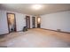 Spacious bedroom featuring crown molding, closet, and multiple doorways at 204 Mitchell Rd, Fayetteville, GA 30214
