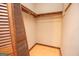 Small walk-in closet featuring sliding doors and shelving at 204 Mitchell Rd, Fayetteville, GA 30214