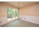 Traditional dining room with large window and chandelier at 204 Mitchell Rd, Fayetteville, GA 30214