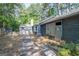 View of the home's exterior, with a backyard path leading to an additional structure at 204 Mitchell Rd, Fayetteville, GA 30214