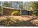 Lovely single-story home featuring mixed stone and siding and mature landscaping at 204 Mitchell Rd, Fayetteville, GA 30214