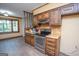 Kitchen with stainless steel oven and view to breakfast nook at 204 Mitchell Rd, Fayetteville, GA 30214