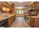 Well-lit kitchen with stainless steel appliances and tile flooring at 204 Mitchell Rd, Fayetteville, GA 30214