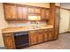Kitchen featuring wood cabinets and stainless steel appliances at 204 Mitchell Rd, Fayetteville, GA 30214