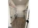 Walk-in closet with shelving and ample storage space, great for organization at 4529 Jersey Covington Rd, Covington, GA 30014