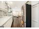 Bright kitchen with stainless steel appliances, white cabinets, and a large island perfect for entertaining at 2695 Peeler Rd, Doraville, GA 30360