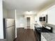 Modern kitchen with stainless steel appliances, granite countertops, and ample cabinet space, great for cooking and storage at 4250 Timber Valley Ct, Decatur, GA 30032