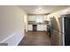 Modern kitchen features stainless steel appliances and granite countertops at 4992 Needle Knob Ct, Lithonia, GA 30038