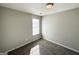Neutral bedroom with plush carpet, window with blinds, and ample natural light at 210 Huntington Dr, Mcdonough, GA 30253