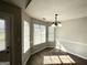 Bright dining area features wood-look flooring and a stylish chandelier at 210 Huntington Dr, Mcdonough, GA 30253