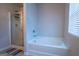 A modern bathroom with a separate shower and a soaking tub at 1735 Labonte Pkwy, Mcdonough, GA 30253