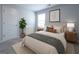 Cozy bedroom with a plush bed, stylish bedding, and a window for natural light at 1735 Labonte Pkwy, Mcdonough, GA 30253