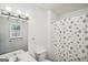 Bathroom features vanity and shower at 3980 Carlton Cove Ct, Loganville, GA 30052