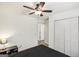 Spacious bedroom with closet and ceiling fan at 3980 Carlton Cove Ct, Loganville, GA 30052
