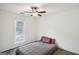 Cozy bedroom with natural light and wood floors at 3980 Carlton Cove Ct, Loganville, GA 30052