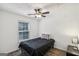 Bedroom with window and hardwood floors at 3980 Carlton Cove Ct, Loganville, GA 30052