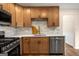 This remodeled kitchen has stainless steel appliances, light countertops, and backsplash at 9591 Teal Ter, Jonesboro, GA 30238