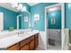 Bright bathroom showcasing vanity with marble countertop and decorative mirror, complemented by modern fixtures at 368 Yellowwood Dr, Sharpsburg, GA 30277