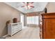 Bedroom featuring neutral paint, carpeting, and a large window with blinds and curtains at 368 Yellowwood Dr, Sharpsburg, GA 30277