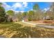 Lovely house with a detached garage and a spacious lawn, offering a serene setting at 368 Yellowwood Dr, Sharpsburg, GA 30277