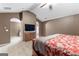 Primary bedroom featuring neutral paint, carpeting, and en-suite access at 368 Yellowwood Dr, Sharpsburg, GA 30277