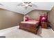 A primary bedroom featuring neutral paint, carpet, a bed and bedside tables at 368 Yellowwood Dr, Sharpsburg, GA 30277