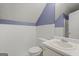 Small bathroom features a tile backsplash and flooring, and shower doors at 1416 Flanagan Mill Dr, Auburn, GA 30011