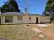 A backyard with siding and a concrete patio offering a serene outdoor space at 240 Carsons Cv, Mcdonough, GA 30253