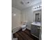 This bathroom features a shower-tub combo and a vanity with storage at 240 Carsons Cv, Mcdonough, GA 30253